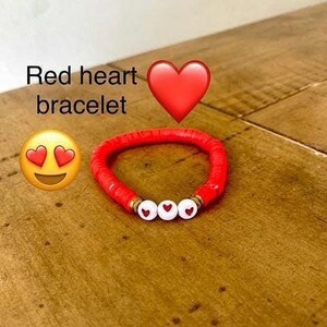 Red hearts Heishi bracelet with gold beads