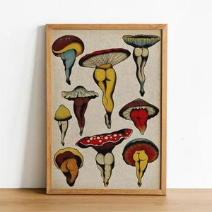 May include: A framed print featuring whimsical mushroom illustrations. The mushrooms have colorful caps and are depicted with human-like legs. The artwork is set against a neutral background and framed in a wooden border, creating a unique and playful aesthetic.