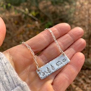 Momma bear and her cub necklace.