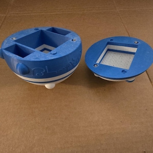 May include: A blue and white ceramic trinket box with a lid. The box has four compartments and the lid has a square compartment. The box has the words "Oh, the places you'll go!" printed on the side.
