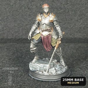 May include: A miniature figurine of a knight in silver plate armor with gold accents, a maroon cloth waist wrap, and a sword. The figure stands on a textured gray rock base, which is labeled as a 25mm base, and features a helmet with vertical slits.