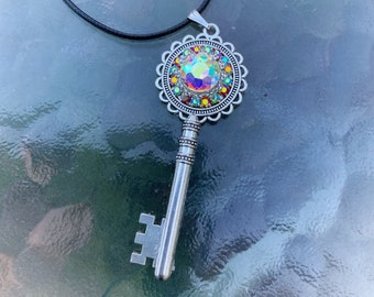 Aurora Borealis Crystal Key Necklace: Silver Flower Filigree Pendant
