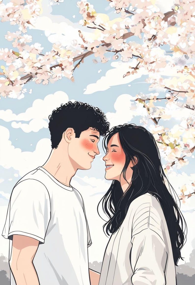 May include: A couple is standing close together, looking at each other with smiles on their faces. They are standing in front of a tree with pink blossoms. The man is wearing a white t-shirt and the woman is wearing a white sweater.