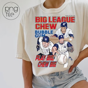 May include: A white t-shirt with a graphic of baseball players and the text "Big League Chew Bubble Gum" and "Play Big Chew Big".
