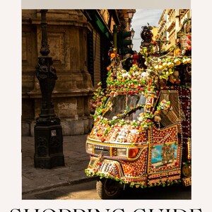 May include: A digital graphic titled La Vintagetta, SECRET PALERMO SHOPPING GUIDE for the Made in Italy lover traveling to Sicily. The image features a brightly decorated three-wheeled vehicle adorned with flowers, lemons, and colorful patterns.