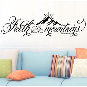 May include: Black and white wall decal with the text "Faith can move mountains - Matthew 17:20". The decal features a stylized mountain range with a sun rising behind it.