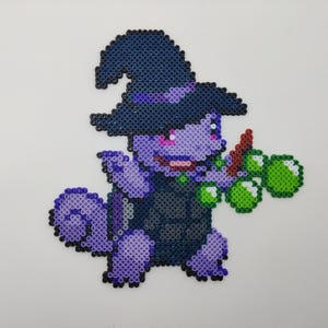 Arte de píxeles con cuentas de bruja y ardilla para Halloween