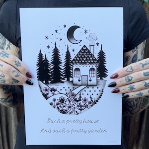 May include: Black and white illustration of a small house with a chimney, surrounded by trees and flowers. The moon is in the sky above the house. The text "Such a pretty house and such a pretty garden" is below the illustration.