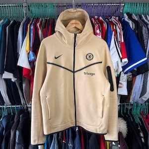 Sudadera con capucha y cremallera completa Nike Chelsea Tech Fleece color beige, talla M (fútbol americano/soccer) imagen 1