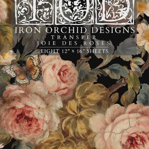 May include: A floral transfer sheet featuring a vintage design with large pink roses, butterflies, and foliage against a dark background. The text "IRON ORCHID DESIGNS TRANSFER JOIE DES ROSES" is displayed, along with "EIGHT 12" x 16" SHEETS".