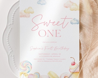 May include: A pink and white invitation card with the text "Sweet One" and "Sophia's First Birthday". The card features a watercolor illustration of clouds and sweets, including a lollipop, a heart-shaped cookie, a macaron, a donut, and an ice cream cone.