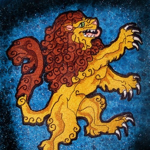 May include: A gold and brown embroidered lion with a curled mane, standing on a blue sparkly background.