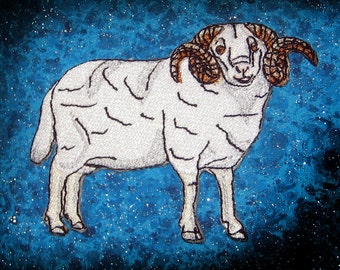 May include: A white ram with brown curled horns against a blue starry background.