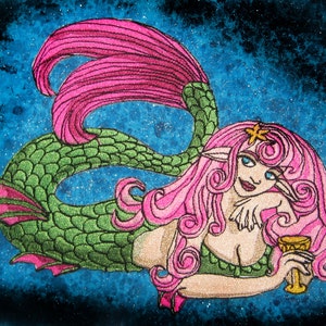 May include: A mermaid with pink hair and a green tail holds a golden goblet. She is depicted against a blue and black starry background.
