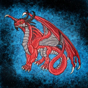 May include: Red dragon with black horns and wings, embroidered on a blue background with a speckled texture.