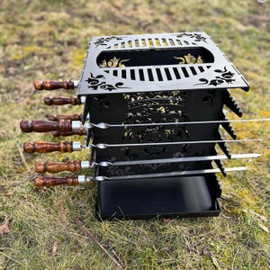 Parrilla ecológica plegable vertical con rejilla