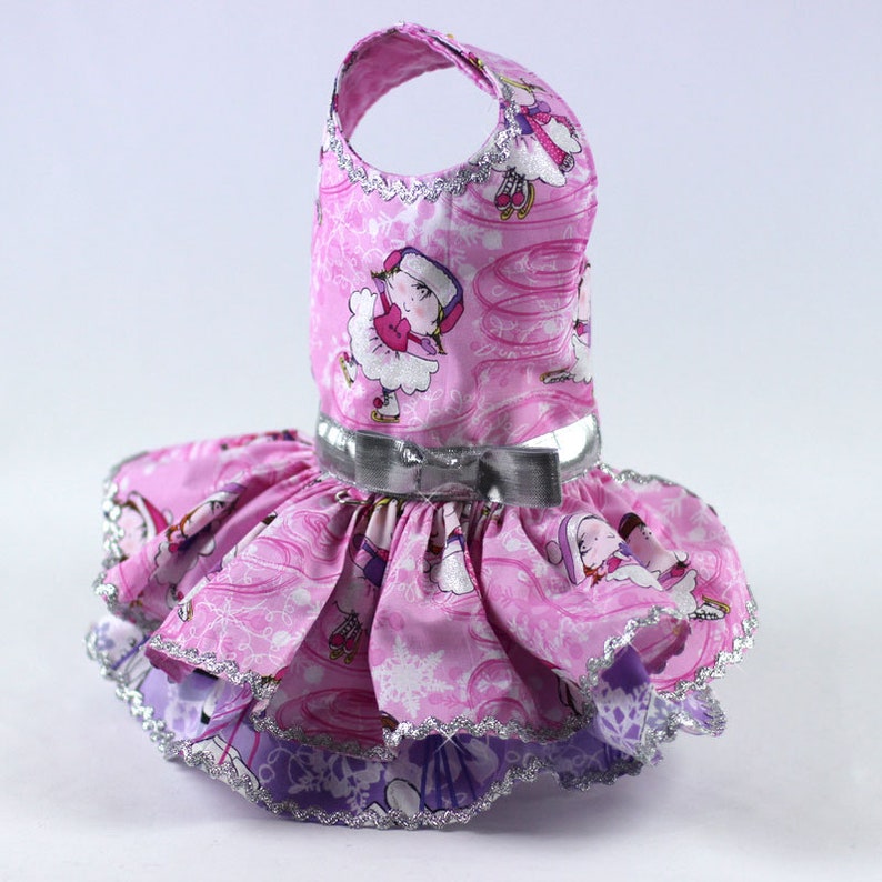 Harness Winter Ruffle Dress features a Skater Print on Pink and Purple Background Dog dress for the Christmas Holiday Custom Made