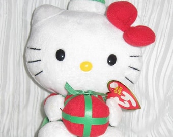 Ty Beanie Baby - Hello Kitty - Dressed in Red and Green for Christmas - Holding a Holiday Gift - Original Tag - Collectible Beanie
