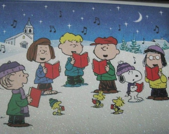 Framed Peanuts Characters Winter Scene - Framed in a Brown Wood Frame - 7 3/4" x 5 3/4" - Singing Christmas Carols