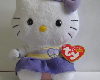 Ty Beanie Baby - Hello Kitty - In a Purple Dress with Heart Shaped Peace Sign -Original Tag - Collectible Beanie - Cat Plush