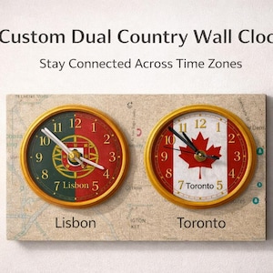 May include: A custom dual country wall clock with two clock faces. One shows the Portuguese flag, the other the Canadian flag. The text "Lisbon" and "Toronto" is below the clocks. The text "Stay Connected Across Time Zones" is above the clocks.