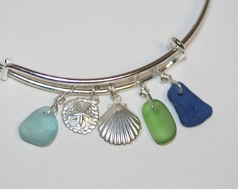 Adjustable silver bracelet with sterling silver sand dollar, seashell charm and pretty genuine sea glass