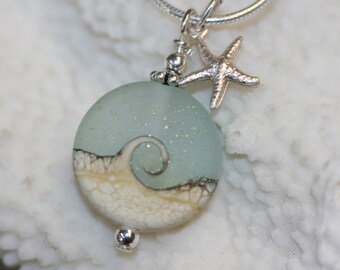 Ocean wave necklace - sterling silver sea star- star fish - lamp work ocean wave bead pendant - aqua beach necklace- sea glass pendant