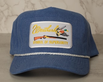 Weatherby-snapbackhoed, symbool van superioriteit, vintage stijl