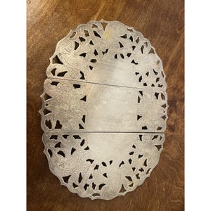 Dessous de plat réglable en métal argenté