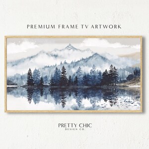 May include: A watercolor painting of a mountain range with a lake in the foreground. The mountains are a light blue color and the lake is a dark blue color. The trees are a dark green color and there is a light fog in the background.