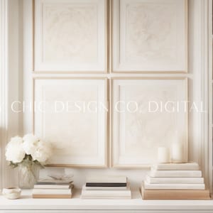 May include: A white bookshelf with a white vase and books on the shelves. A white lamp with a white shade is on a white table with a vase of white flowers. There are four framed pictures on the wall behind the table. The pictures are all white with a gold frame. The text "PRETTY CHIC DESIGN CO. DIGITAL IMAGES" is on the wall.