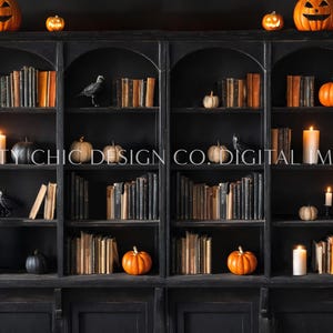 May include: A black wooden bookcase with multiple shelves filled with books. The bookcase is decorated with pumpkins, candles, and ravens. The text "PRETTY CHIC DESIGN CO. DIGITAL IMAGES" is printed on the front of the bookcase.
