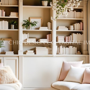 May include: A white bookshelf with multiple shelves filled with books, some with pink spines. The bookshelf is in a living room with a white couch and pink pillows. There are plants on the shelves and in the window.