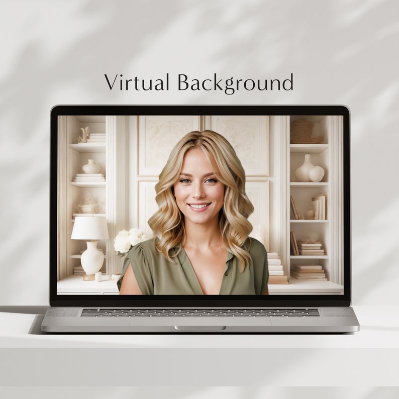 May include: A woman with blonde hair is on a video call. She is wearing a green shirt and smiling. The background is a virtual bookshelf with white shelves and books.