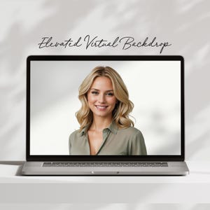 May include: A woman with long blonde hair is on a laptop screen. She is wearing a light green shirt and smiling. The text "Elevated Virtual Backdrop" is at the top of the screen.