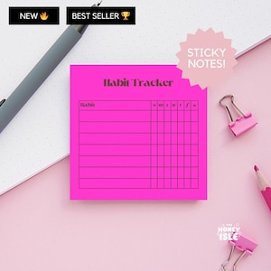 May include: Pink sticky note with a habit tracker grid. The note has the text "Habit Tracker" at the top and columns labeled "Habit", "x", "m", "t", "w", "t", "f", "s".