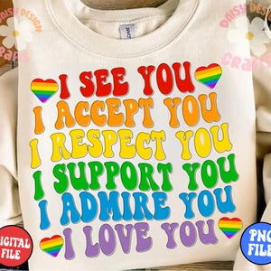 May include: A white sweatshirt with a rainbow heart and the text "I see you, I accept you, I respect you, I support you, I admire you, I love you" in a retro font.