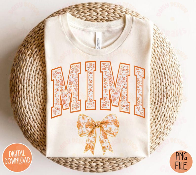 May include: A white t-shirt with the word "MIMI" printed in orange and white floral letters. A small orange and white floral bow is below the word.