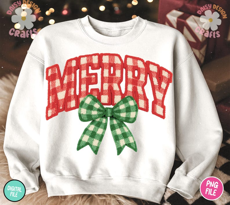 May include: White sweatshirt with the word "MERRY" in red and white plaid lettering. A green and white plaid bow is centered below the word. The sweatshirt is a festive holiday design.