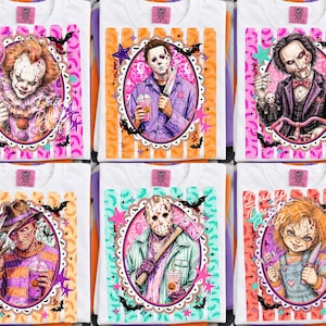 May include: A collection of six white t-shirts featuring horror movie characters including Pennywise, Michael Myers, Jigsaw, Freddy Krueger, Jason Voorhees, and Chucky. Each character is framed in an oval with colorful striped backgrounds and bats.