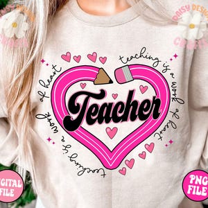 May include: A pink heart with a pencil outline and the word "Teacher" in a retro font. The text "Teaching is a work of heart" is written around the heart.