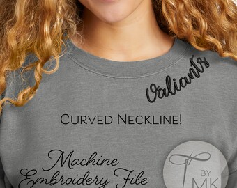 May include: A gray sweatshirt with the word "Valiants" embroidered in black script. The text "CURVED NECKLINE!" is below the word "Valiants". The words "Machine Embroidery File" are also visible. A logo with the letters "MK" is in the lower right corner.
