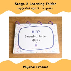May include: A white learning folder with purple binding rings. The folder has a blue border and the text "MIA'S Learning Folder Stage 2 3-4 years". The top of the image reads "Stage 2 Learning Folder suggested age 3 - 4 years".