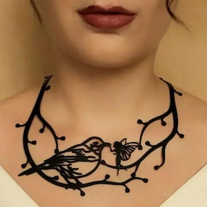 Collar de goma con la frase "Te amo" de Tun