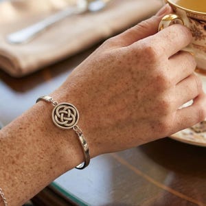 Celtic Shield Knot Bracelet. Stainless steel and silver-plated simple Irish Jewelry.