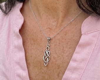 Celtic Motherhood Knot Irish Necklace. Book of Kells Pendant. Family Symbol. Silver plate.