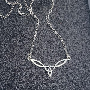 Celtic Trinity Knot Irish Necklace. Elegant Minimalist Pendant on Silver Plated Chain.