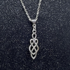 Celtic Motherhood Knot Irish Necklace. Book of Kells Pendant. Family Symbol.
