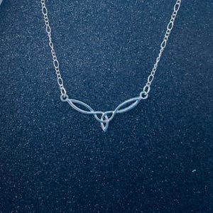 Celtic Trinity Knot Irish Necklace. Elegant Minimalist Pendant on Silver Plated Chain.