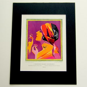 May include: A vintage magazine advertisement featuring a woman with a red and orange turban, wearing a pink and orange dress, and holding a compact mirror. The background is a vibrant purple.